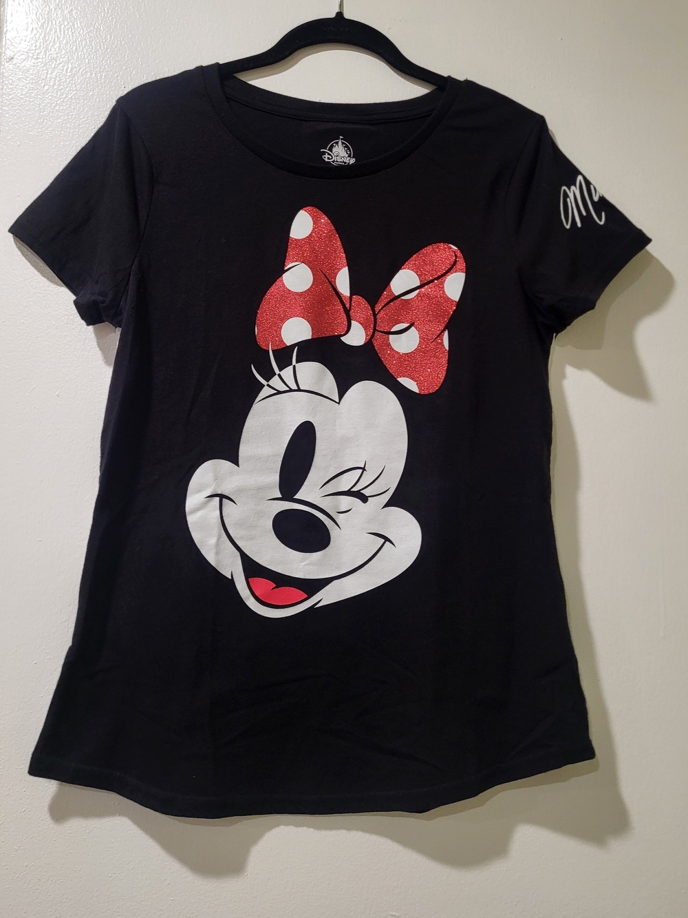 Disney Black Tee with Minnie Mouse Face and Red Polka Dot Bow. Size Medium.